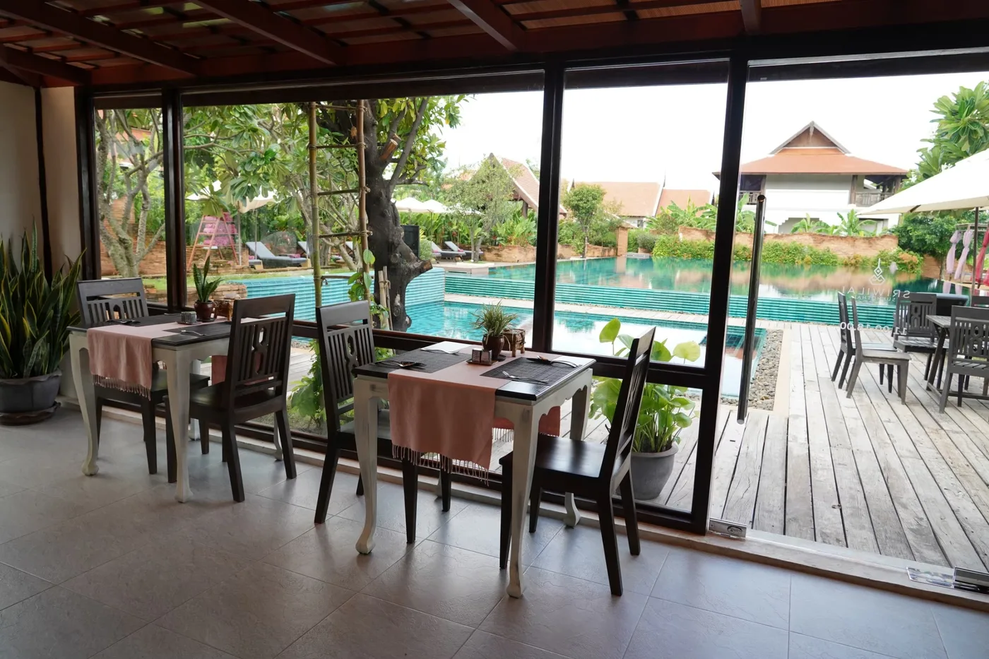 Rim Na Pool Bar overlooking the pool and gardens