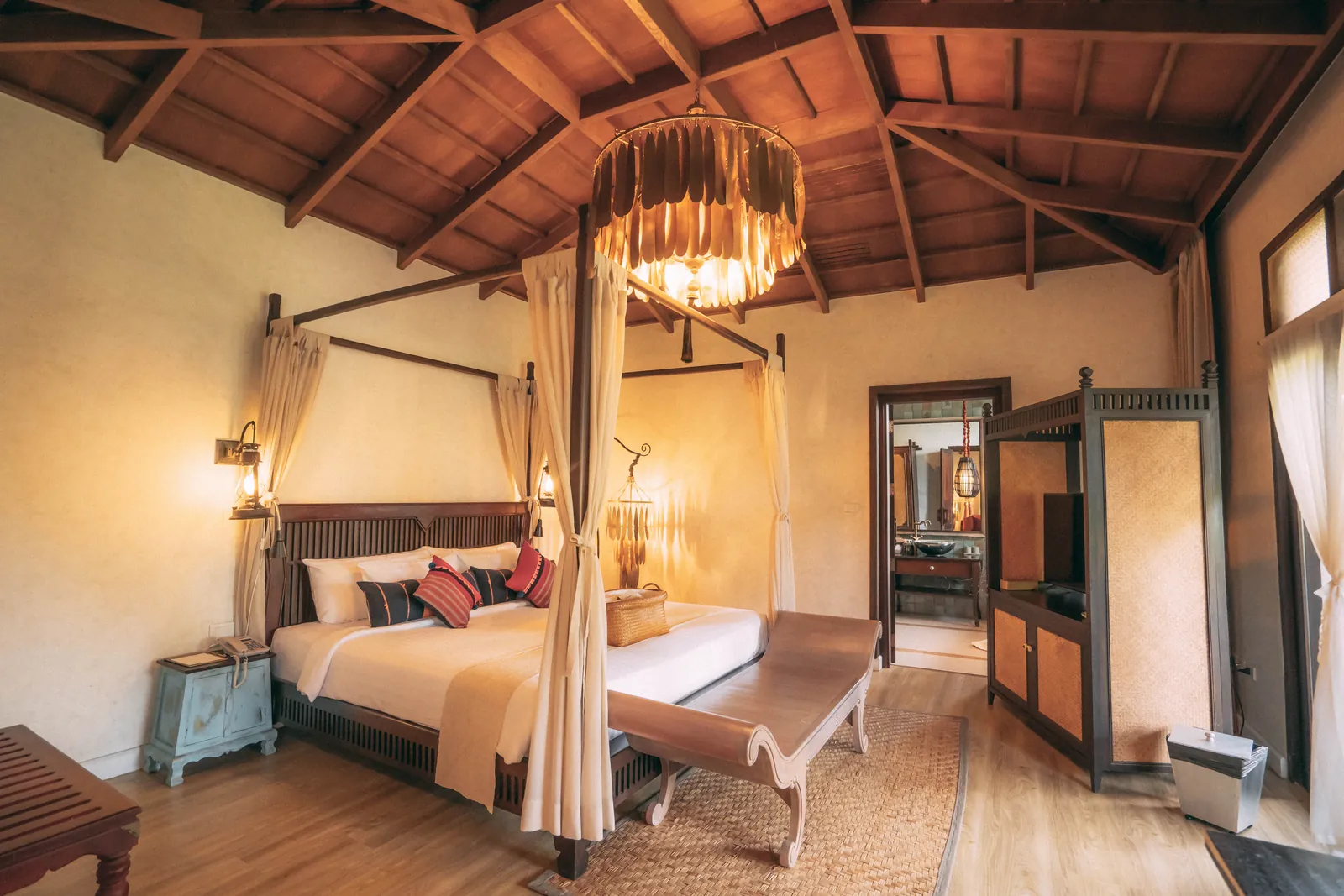 Suite private terrace with view of Wat Chedi Sung ruin at sunset